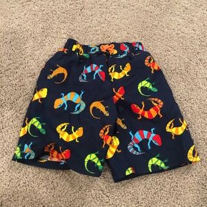 NWOT Oshkosh lizard swim trunks size 2T